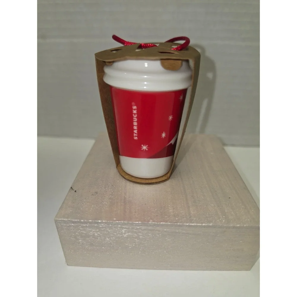 2011 Starbucks Ceramic Holiday To-Go Cup ornament dog and‎ boy on a sled